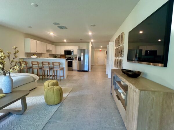 Richmond Cove Palm Bay Holiday Builders Model Home living room view of kitchen