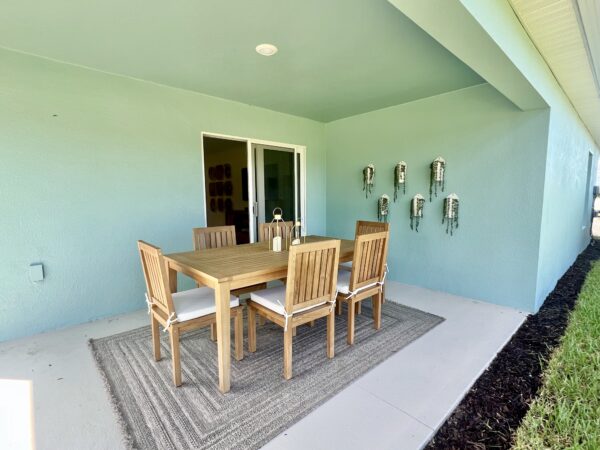 Richmond Cove Palm Bay Holiday Builders Model Home back patio table