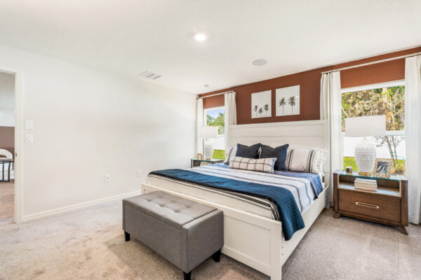 Bedroom view in a Holiday Builders model home