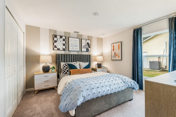 View of bedroom in a Holiday Builders model home
