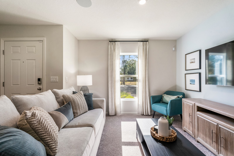 Flagler Estates model home living area by Holiday Builders Inspire Collection