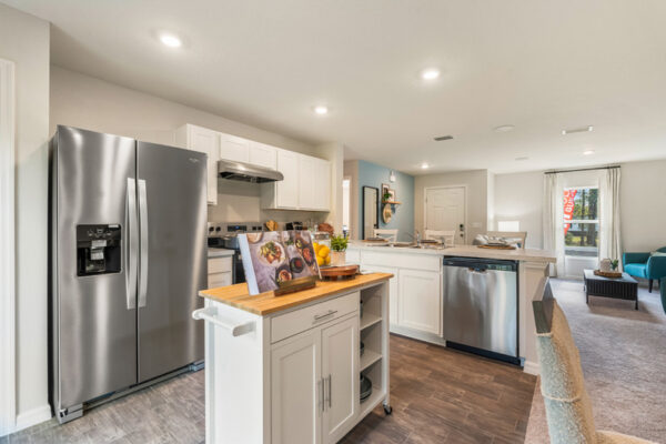 Flagler Estates in Hastings by Holiday Builders white kitchen with island
