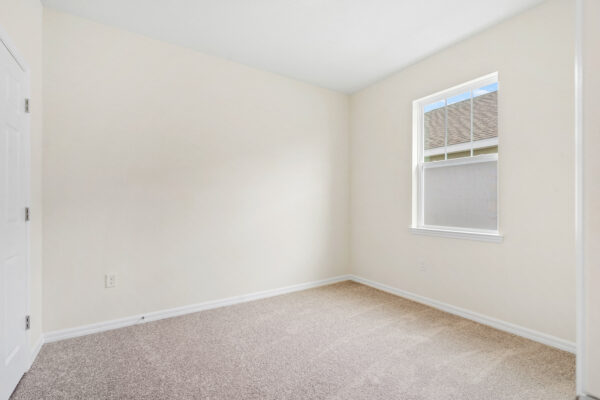 The guest bedroom of the Beverly floorplan from the Cornerstone Collection in Eden Hills