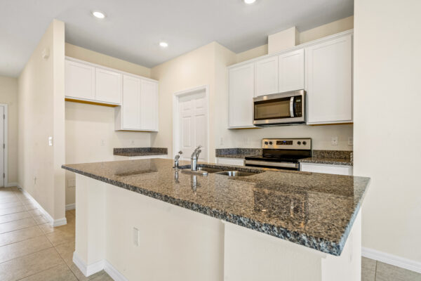 The kitchen of the Beverly floorplan from the Cornerstone Collection in Eden Hills