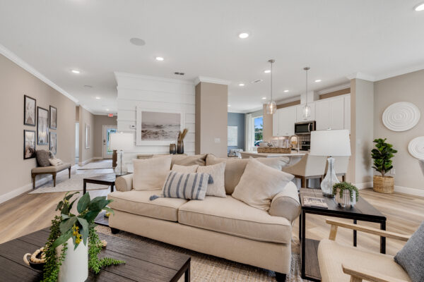The living area of the Biscayne floorplan from the Cornerstone collection by Holiday Builders.