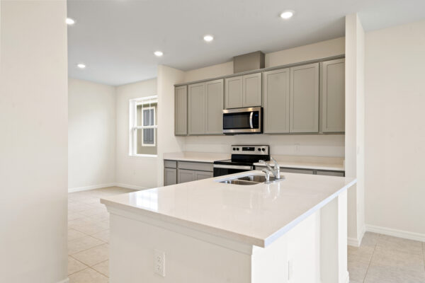 The kitchen of the Biscayne floorplan of the Cornerstone Collection in Eden Hills
