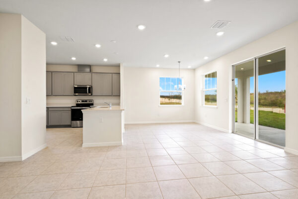 The dining and kitchen areas of the Biscayne floorplan of the Cornerstone Collection in Eden Hills
