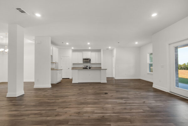 The open concept Caliza floorplan from the Cornerstone collection by Holiday Builders.