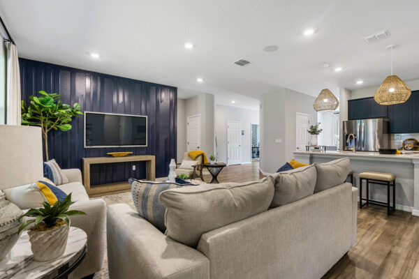 The living area in the Captiva floorplan from the Cornerstone collection by Holiday Builders.