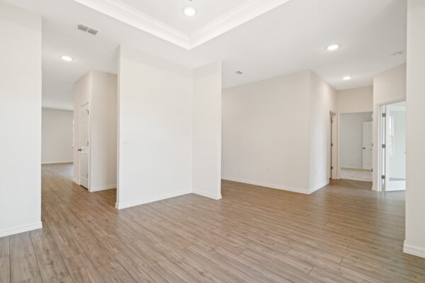 The entryway of the Cedar floorplan from the Cornerstone collection by Holiday Builders.