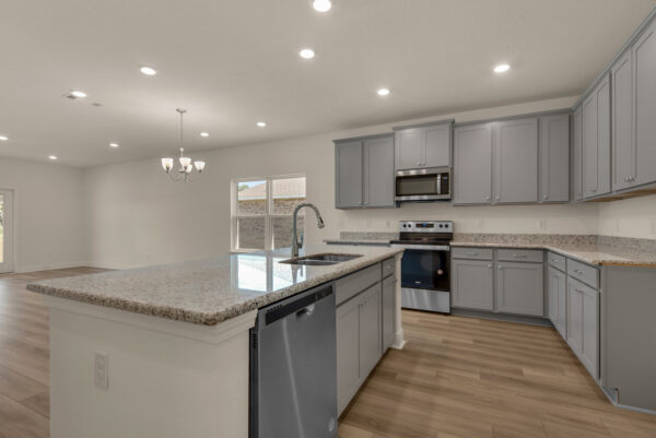 The kitchen view in the Destin floorplan from the Cornerstone collection by Holiday Builders.