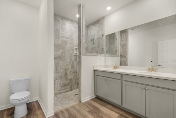 The master bath in the Dora floorplan from the Cornerstone collection by Holiday Builders.