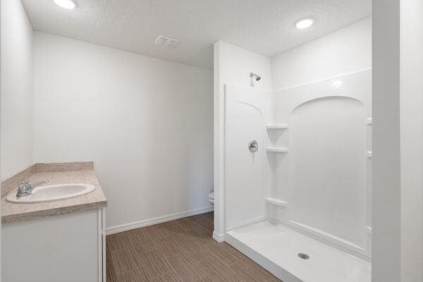 The master bath in the Foxtail floorplan from the Value collection by Holiday Builders.