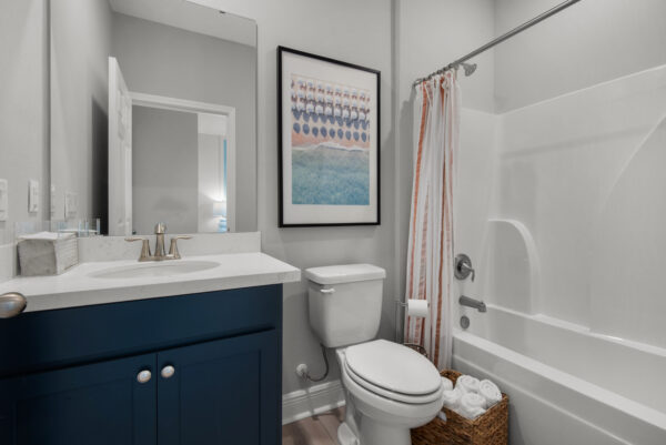 Another guest bath in the Hamilton floorplan from the Cornerstone collection by Holiday Builders.