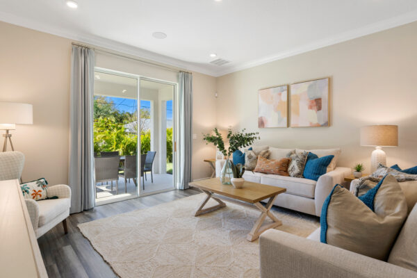 The living area in the Highland floorplan from the Cornerstone collection by Holiday Builders.