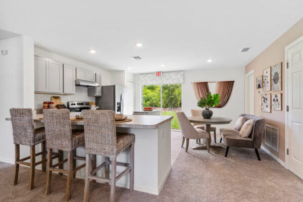 The kitchen view of the Palm floorplan from the Inspire Collection