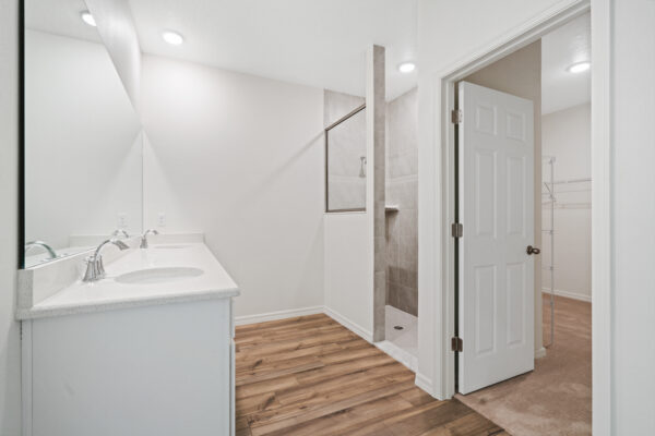 The master bath in the Naples floorplan from the Cornerstone collection by Holiday Builders.