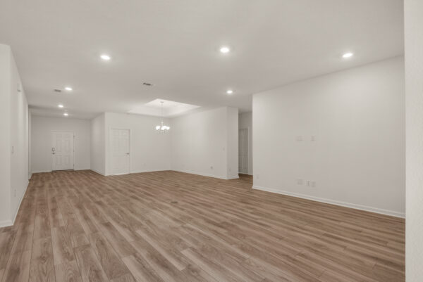 The entryway of the Osprey floorplan from the Cornerstone collection by Holiday Builders.