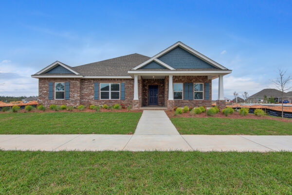 The exterior of the Osprey Floorplan from the Cornerstone Collection by Holiday Builders.
