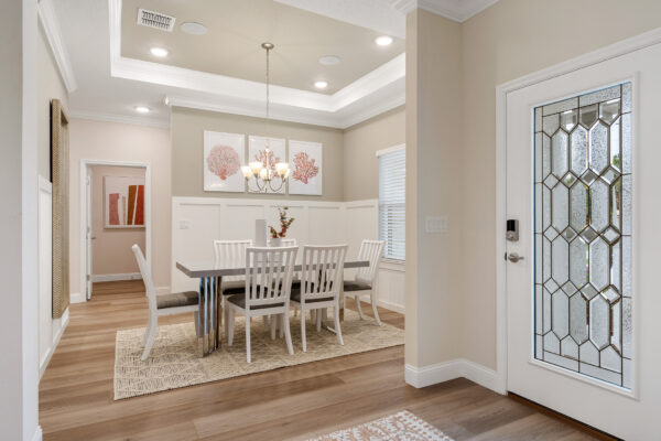 The entry way of the Charlotte floorplan, a Holiday Builders' model home in Palm Coast. 