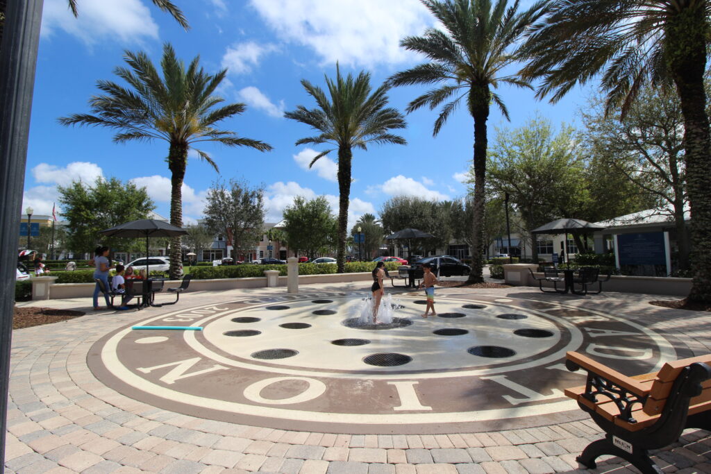 Family gathering at Port St Lucie in Tradition's park, in close proximity to homes built by Holiday Builders.