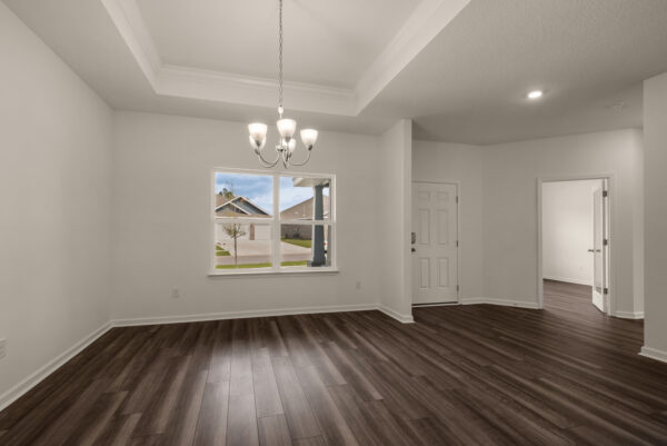 The dining room in the Rosemary floorplan from the Cornerstone collection by Holiday Builders.