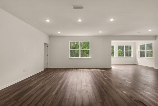 The living area in the Rosemary floorplan from the Cornerstone collection by Holiday Builders.