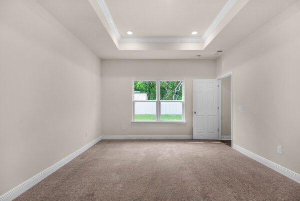 The owner's suite in the Rosemary floorplan from the Cornerstone Collection by Holiday Builders.