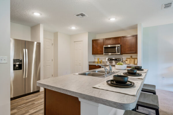 The kitchen in the Royal floorplan from the Value collection by Holiday Builders.