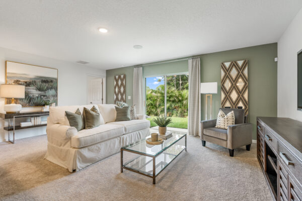 The living area in the Royal floorplan from the Value collection by Holiday Builders.