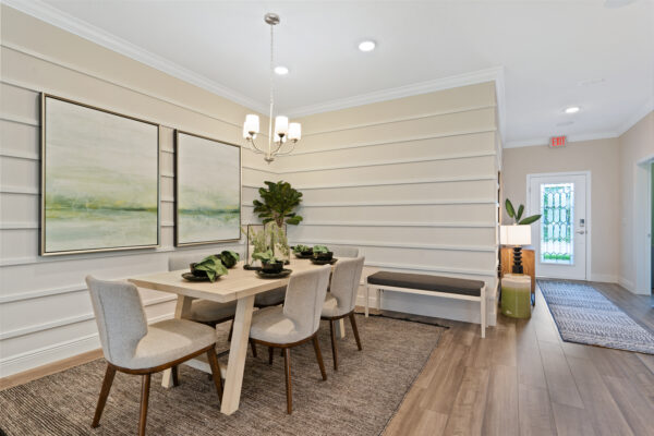 The entryway of the Sanibel floorplan from the Cornerstone collection by Holiday Builders.