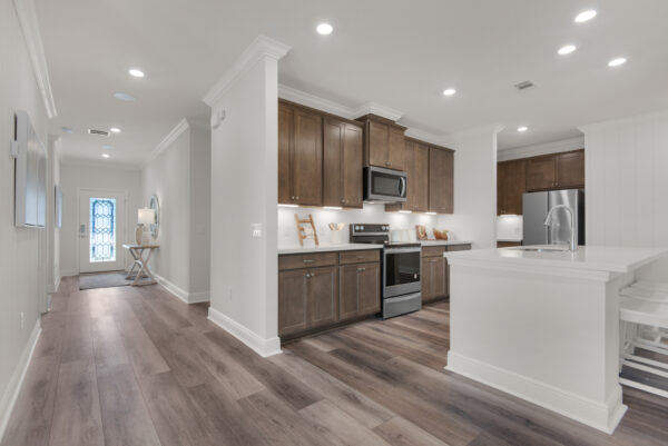 The entryway of the Santa Rosa floorplan from the Cornerstone collection by Holiday Builders.