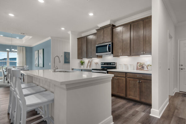 The kitchen in the Santa Rosa floorplan from the Cornerstone collection by Holiday Builders.