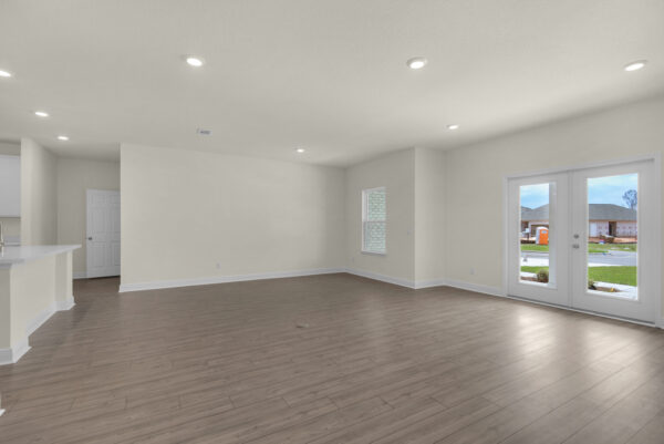 The living area in the Walton floorplan from the Cornerstone Collection by Holiday Builders.