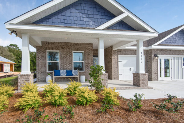 The Holiday Builders model home and sales center located at 4172 Lazy Breeze Lane in Yellow River Ranch, a new home commuity in Milton, FL.