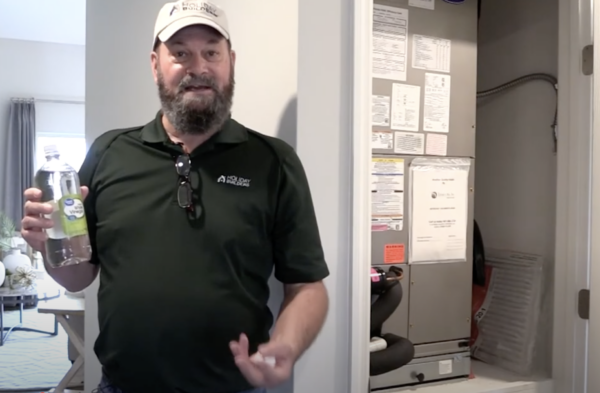 Man offering maintenance tips for air conditioners